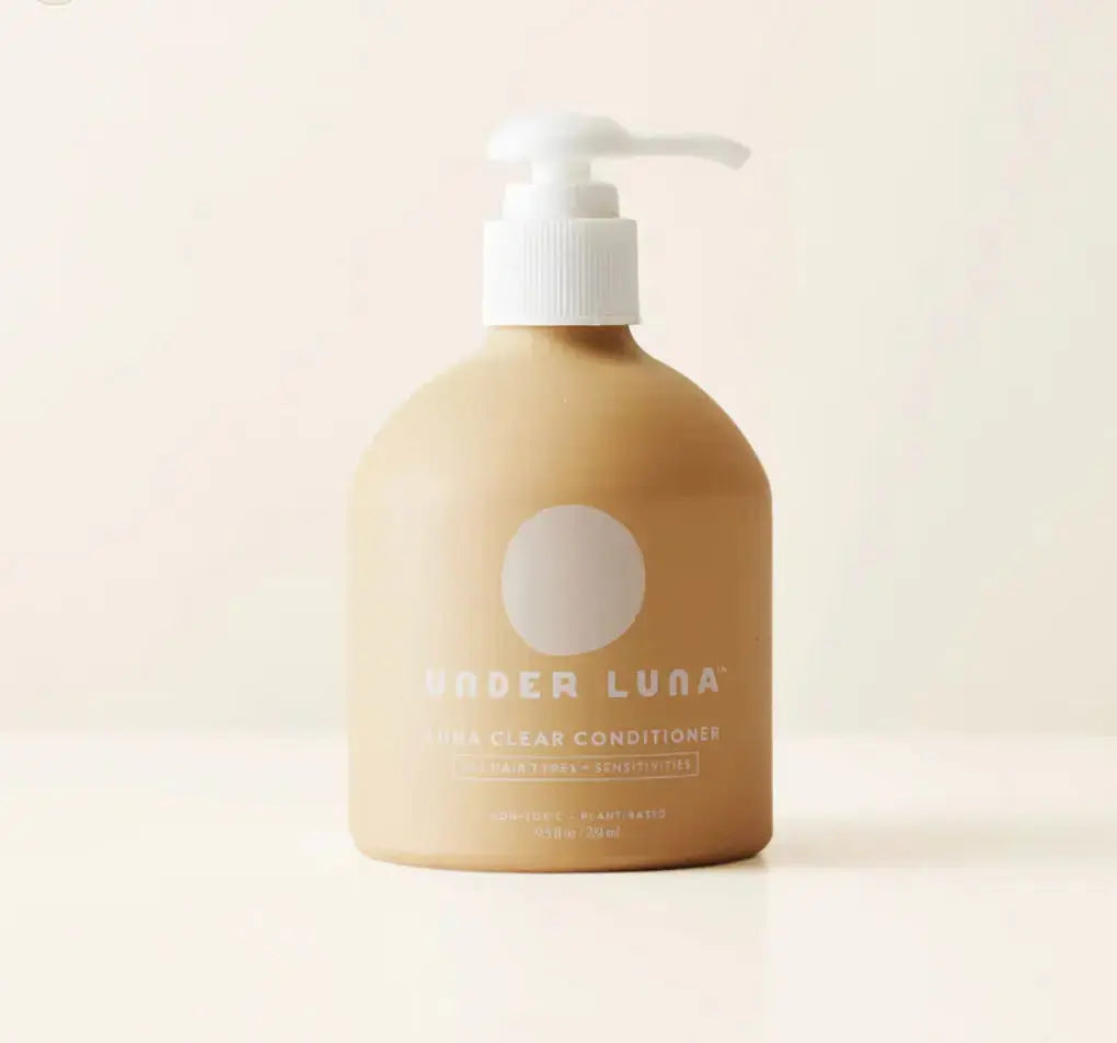 Under Luna Luna Clear Conditioner in a 2oz bottle, suitable for all hair types and sensitivities, with a smooth, creamy texture