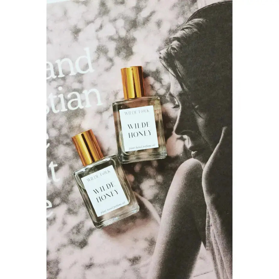 Wilde Folk Wilde Honey perfume bottle with floral and honey-inspired design, showcasing the elegant perfume packaging.