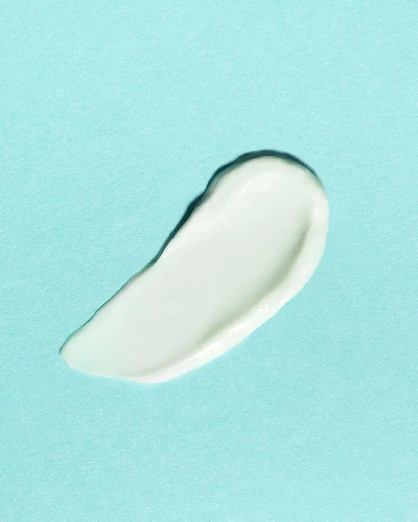 Earth Harbor Mermaid Milk Nutrient Glow Moisturizer in a 2 oz jar, hydrating skincare product with a smooth, luminous finish.