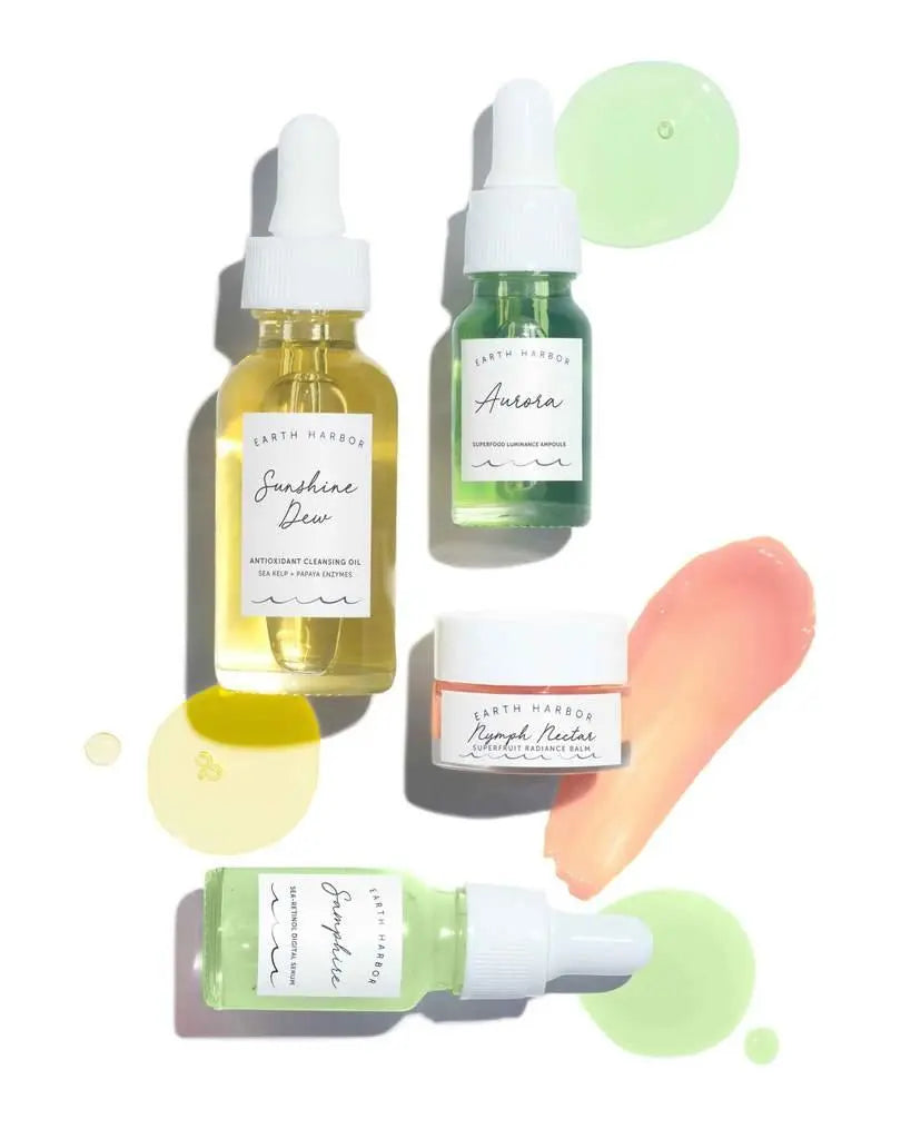 Earth Harbor Smooth Sailing skincare kit with bottles and jars, featuring natural ingredients and eco-friendly packaging.