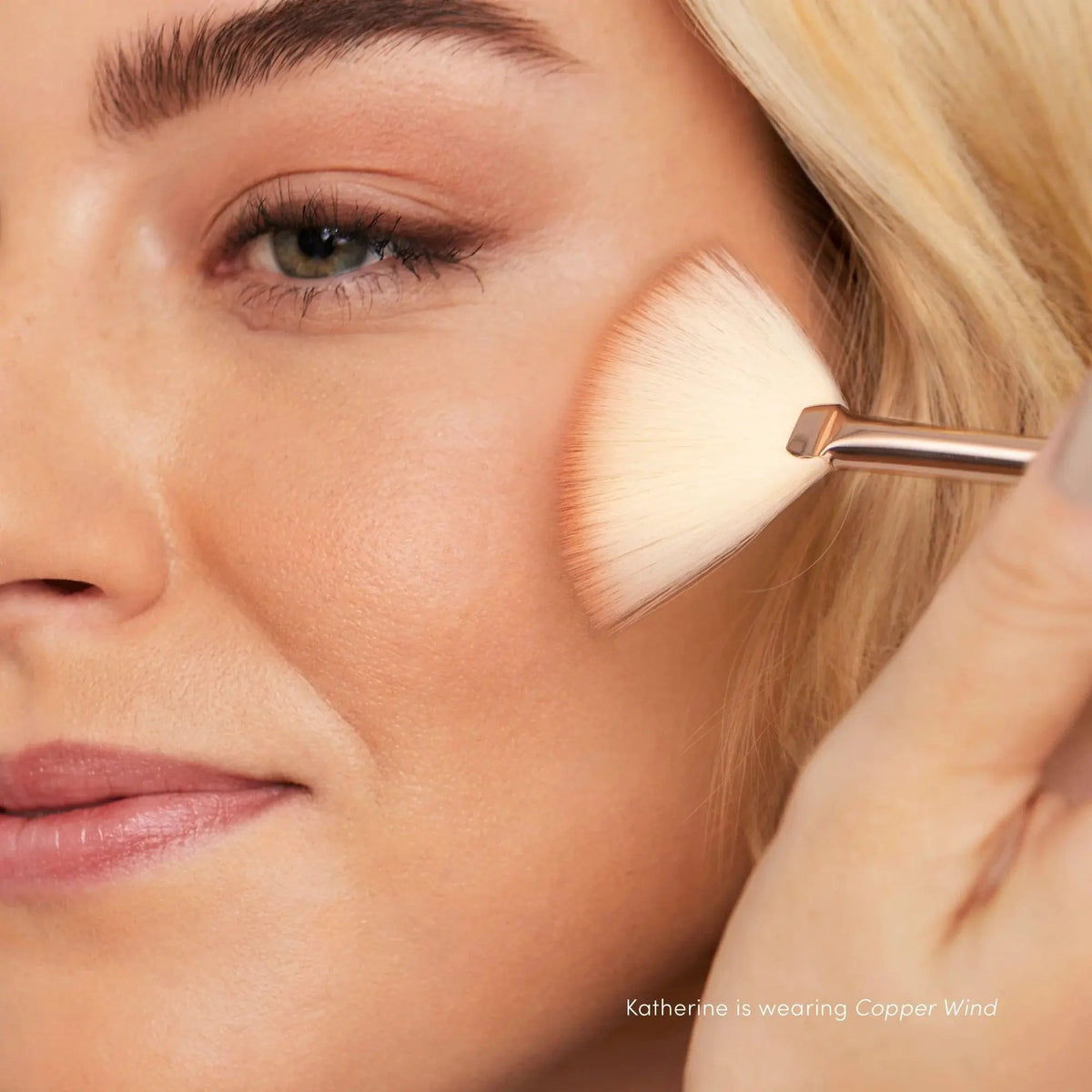 Jane Iredale PurePressed® Blush in Whisper with soft pink pigmentation, showcasing smooth, pressed powder texture.