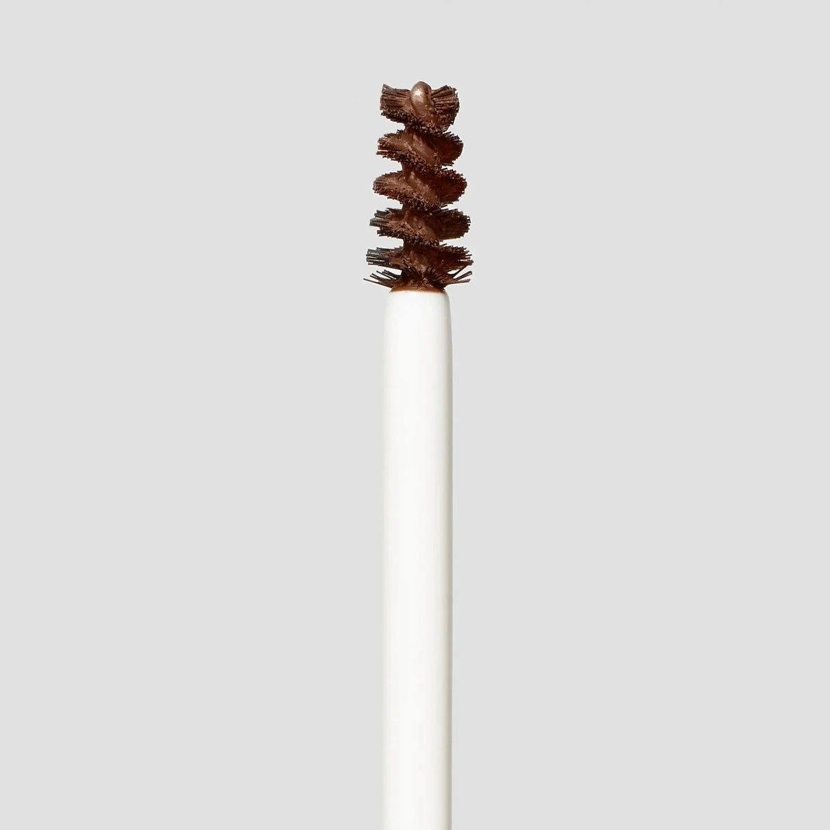 Jane Iredale PureBrow® brow gel in ash blonde, showing the clear tube and brush applicator for natural brow enhancement.