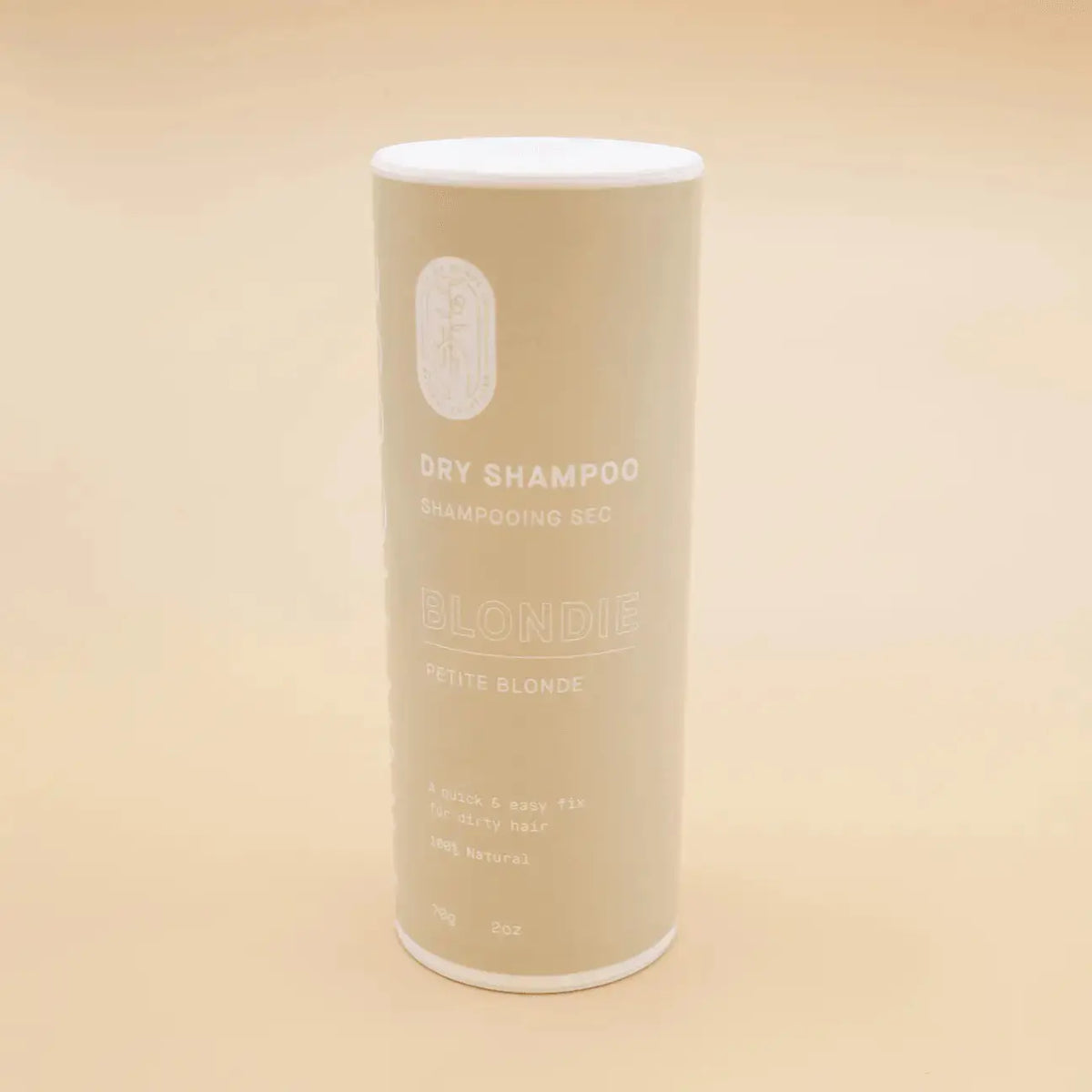 Pink House Natural Solutions dry shampoo for brunettes, with a hot chocolate scent, designed to refresh hair and absorb oil.