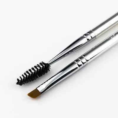 Dual-ended Plume Science cosmetics brush with soft bristles for versatile makeup application, shown with both ends visible.