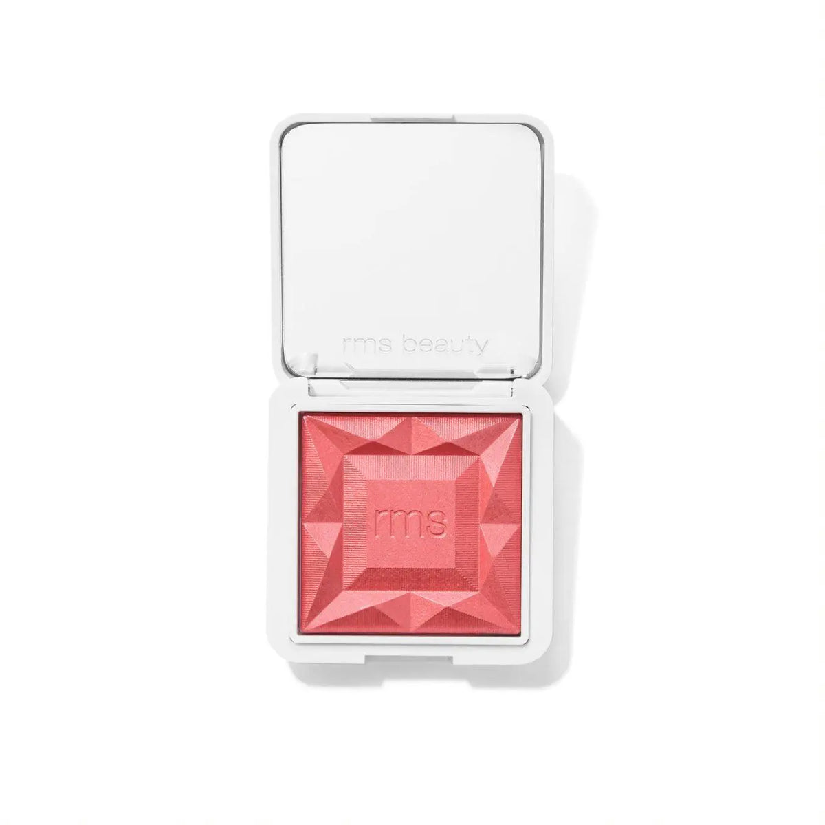 RMS Beauty ReDimension Hydra Blush in Sangria, a vibrant red blush with hydrating formula, displayed on a neutral background.