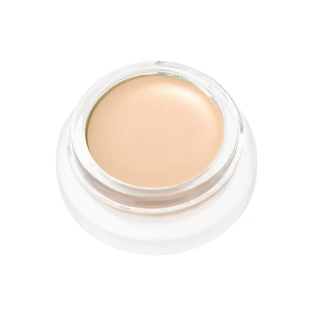 RMS Beauty UnCoverup Concealer in a compact jar, showcasing creamy beige makeup for flawless skin coverage.