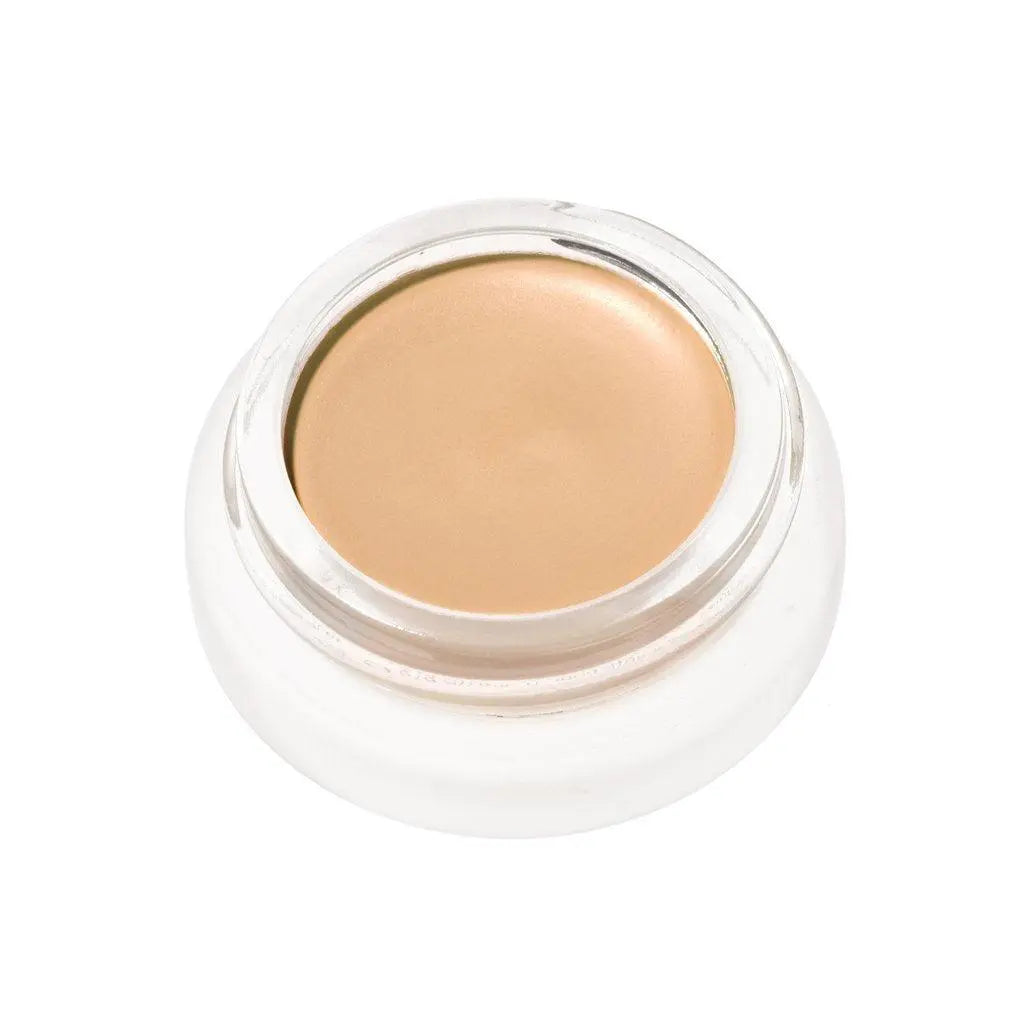 RMS Beauty UnCoverup Concealer in a compact container, showcasing its creamy texture and natural finish for blemish coverage.