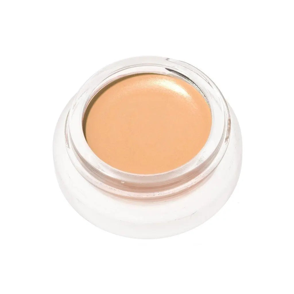 RMS Beauty UnCoverup Concealer in a sleek tube, designed to blend seamlessly for natural coverage of blemishes and imperfections.