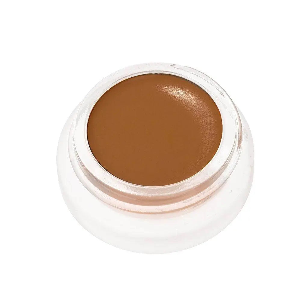 RMS Beauty UnCoverup Concealer in a compact container, showcasing the natural cosmetic product for flawless skin coverage.