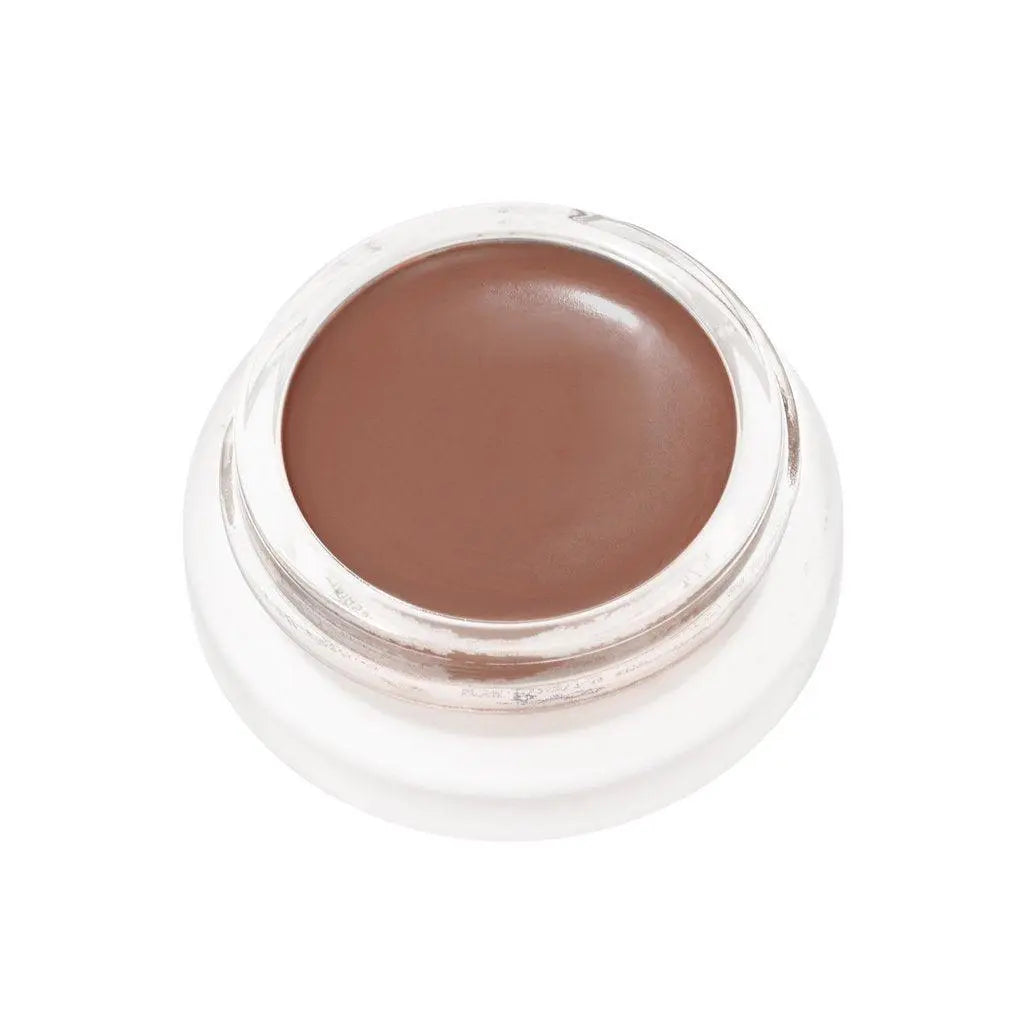 RMS Beauty Lip to Cheek cosmetics in a sleek compact, featuring a natural pink shade for lips and cheeks.