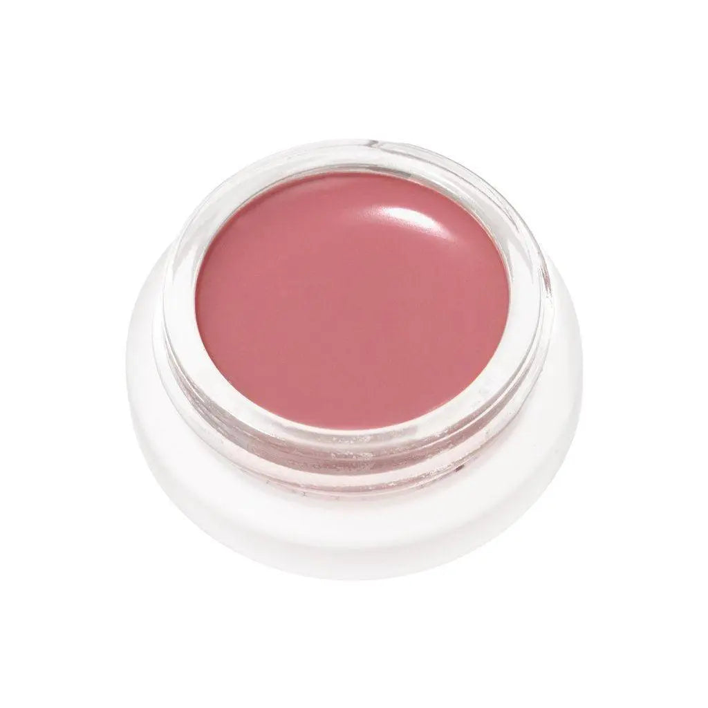 RMS Beauty Lip to Cheek cosmetics in a sleek container, featuring a soft pink shade suitable for lips and cheeks.