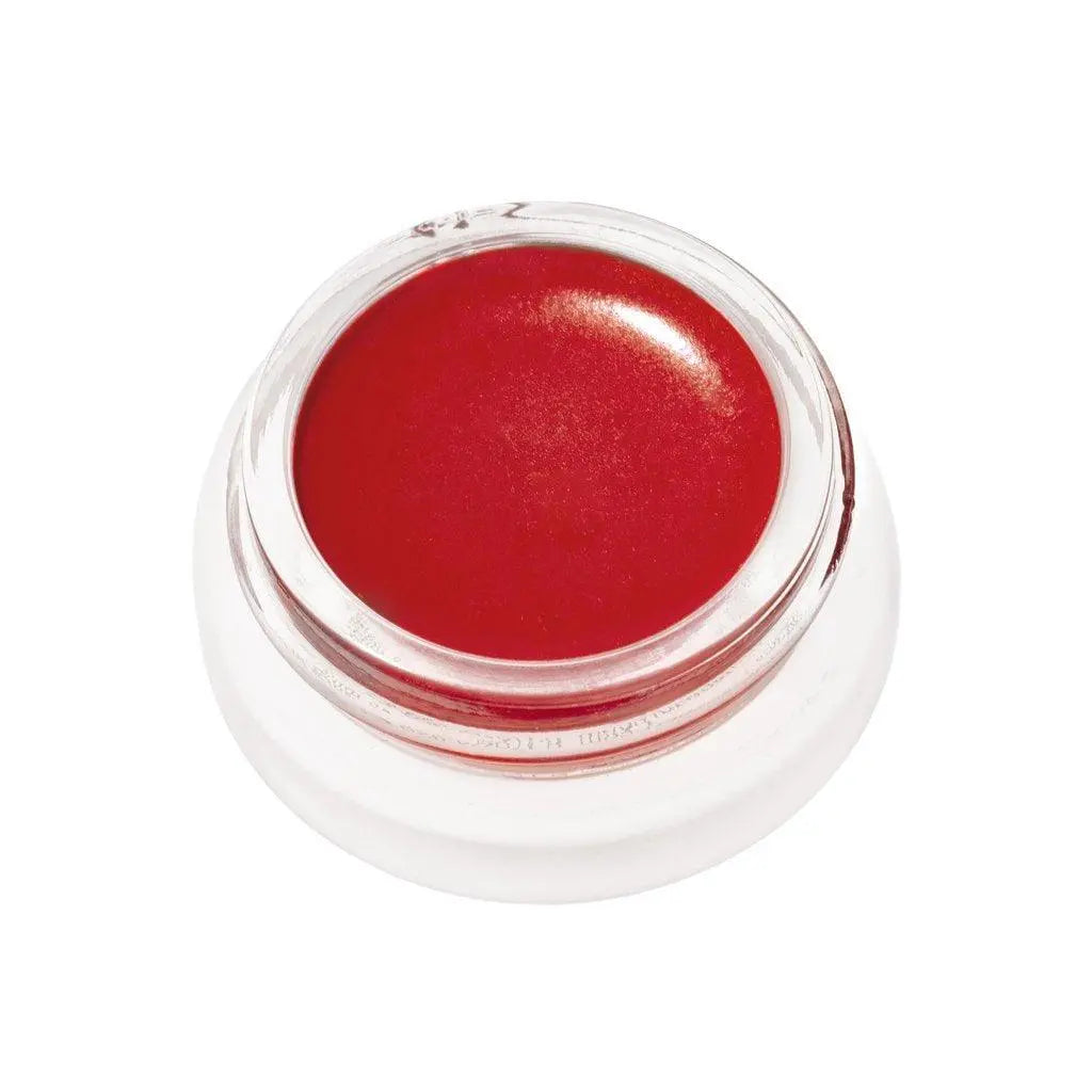 RMS Beauty Lip to Cheek cosmetics in a compact, featuring a natural pink shade with a smooth, creamy texture.