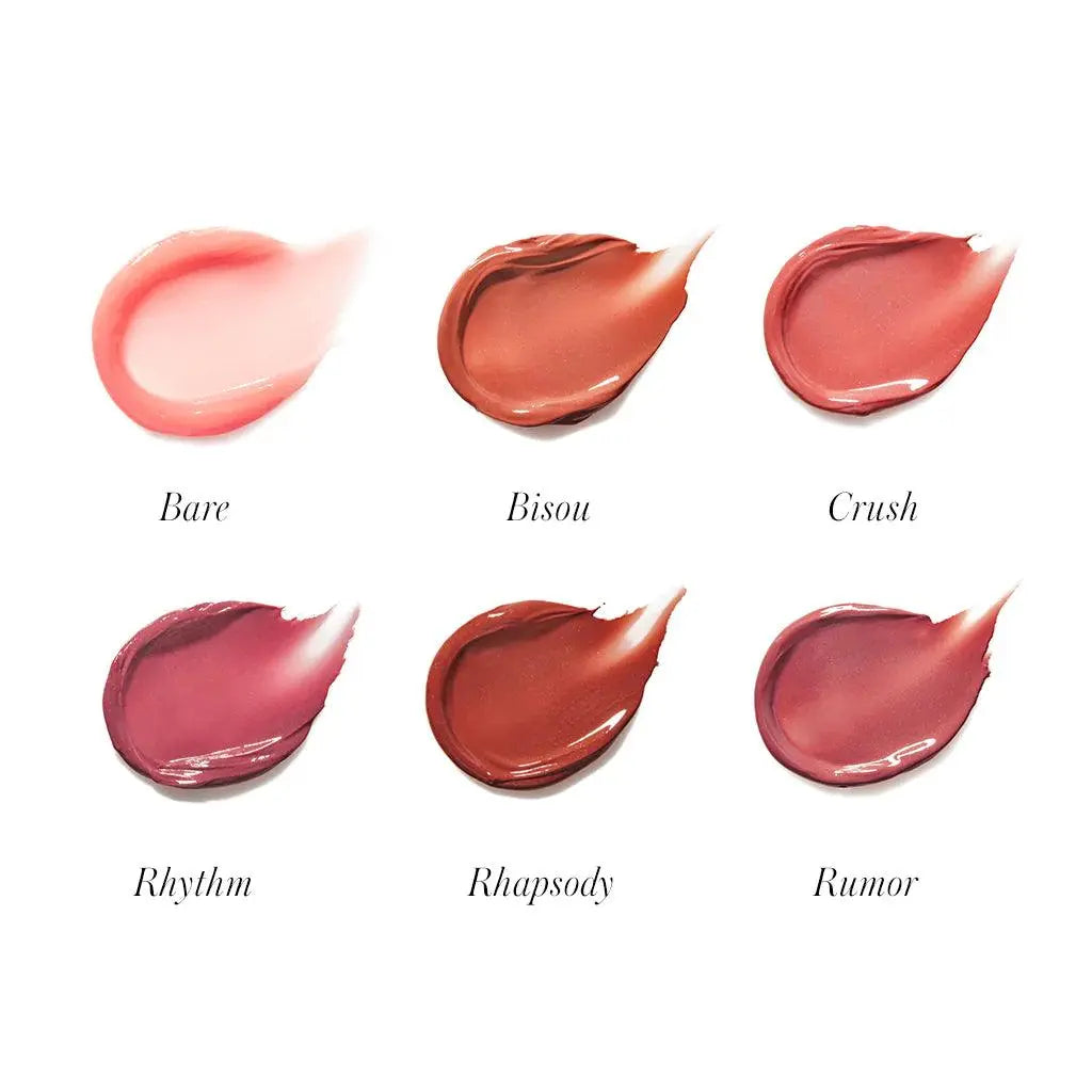 RMS Beauty Liplights Cream Lip Gloss in a natural, bare shade, showcasing a smooth, glossy lipstick application.